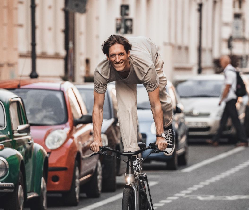 Man riding on the street on a Dance bike